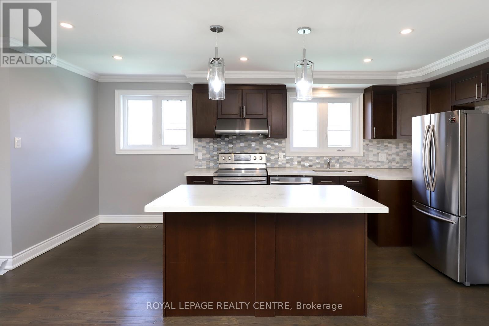 40 Summerfield Crescent, Toronto, Ontario  M9C 3X3 - Photo 3 - W12206648