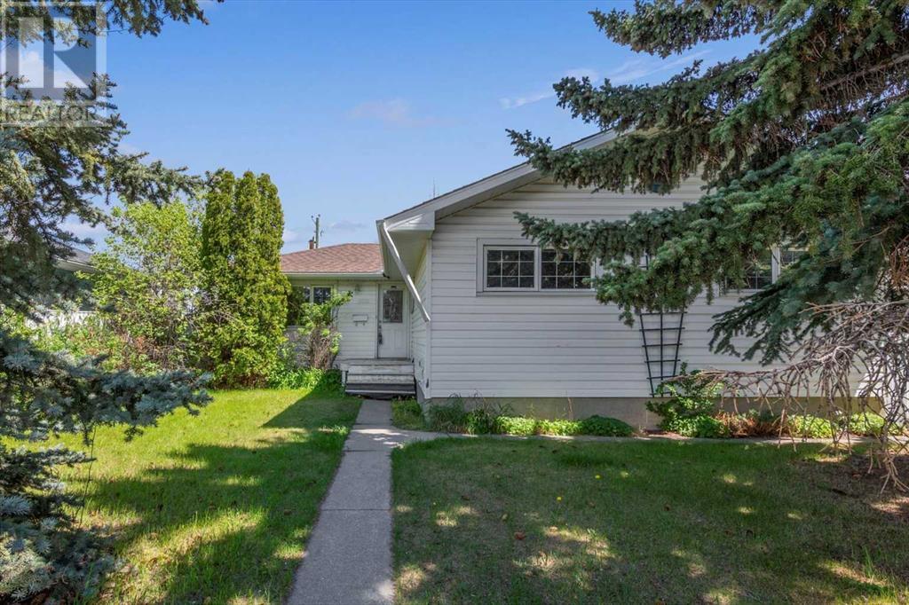 6116 Buckthorn Road Nw, Calgary, Alberta  T2K 2Z1 - Photo 1 - A2225252