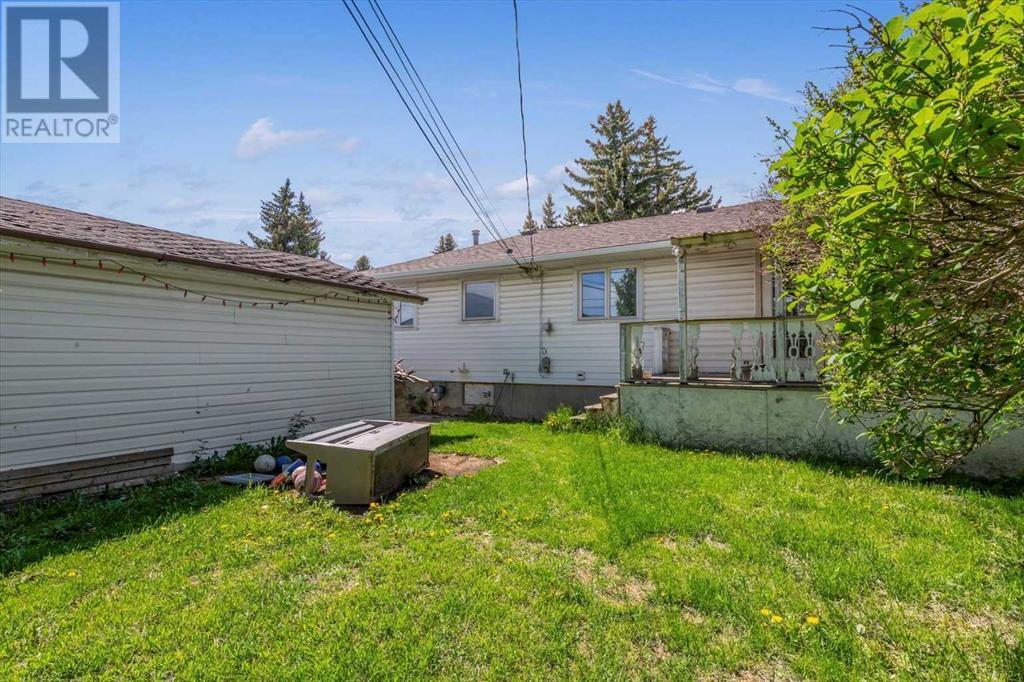 6116 Buckthorn Road Nw, Calgary, Alberta  T2K 2Z1 - Photo 5 - A2225252