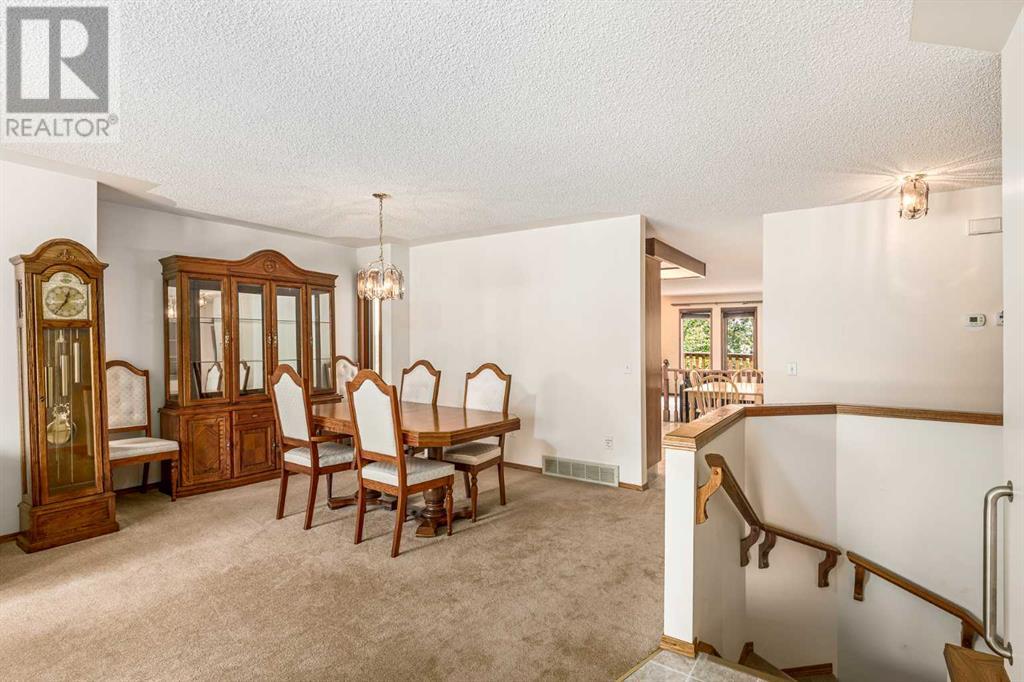 16 Sandalwood Close Nw, Calgary, Alberta  T3K 3Z4 - Photo 8 - A2228361