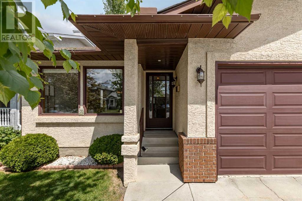 16 Sandalwood Close Nw, Calgary, Alberta  T3K 3Z4 - Photo 3 - A2228361