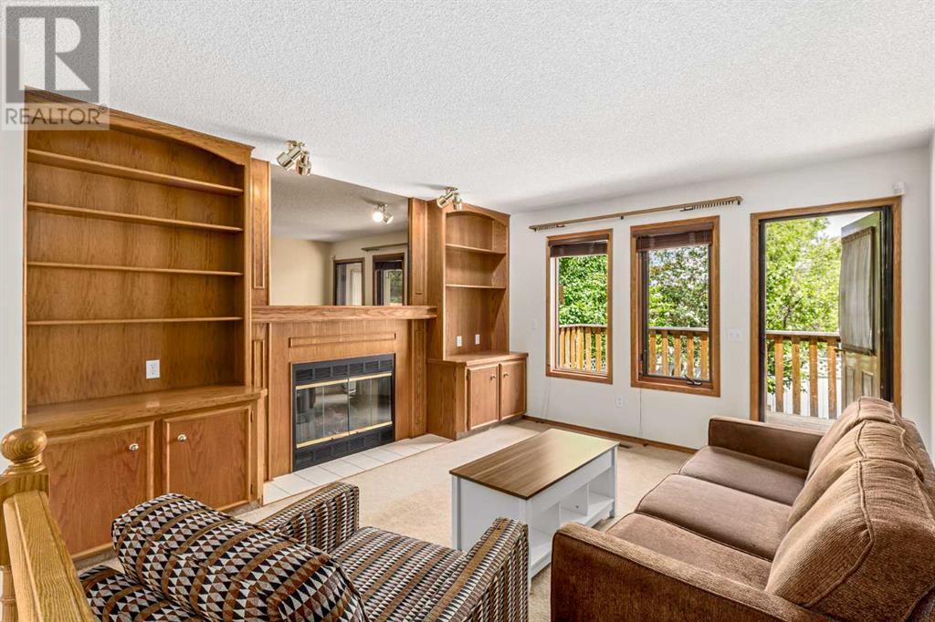 16 Sandalwood Close Nw, Calgary, Alberta  T3K 3Z4 - Photo 16 - A2228361