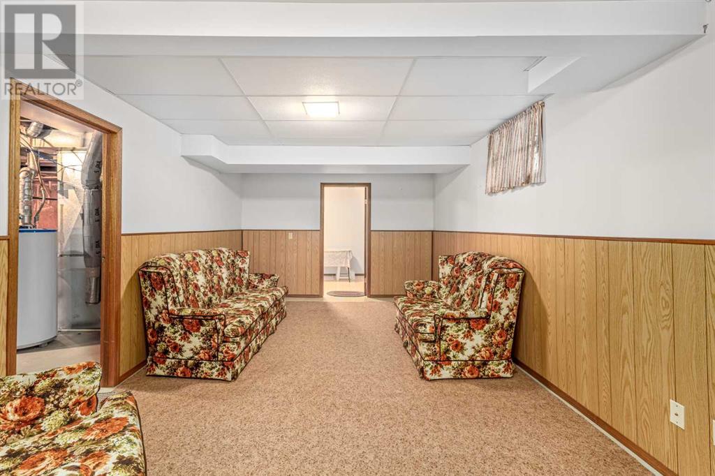 16 Sandalwood Close Nw, Calgary, Alberta  T3K 3Z4 - Photo 31 - A2228361