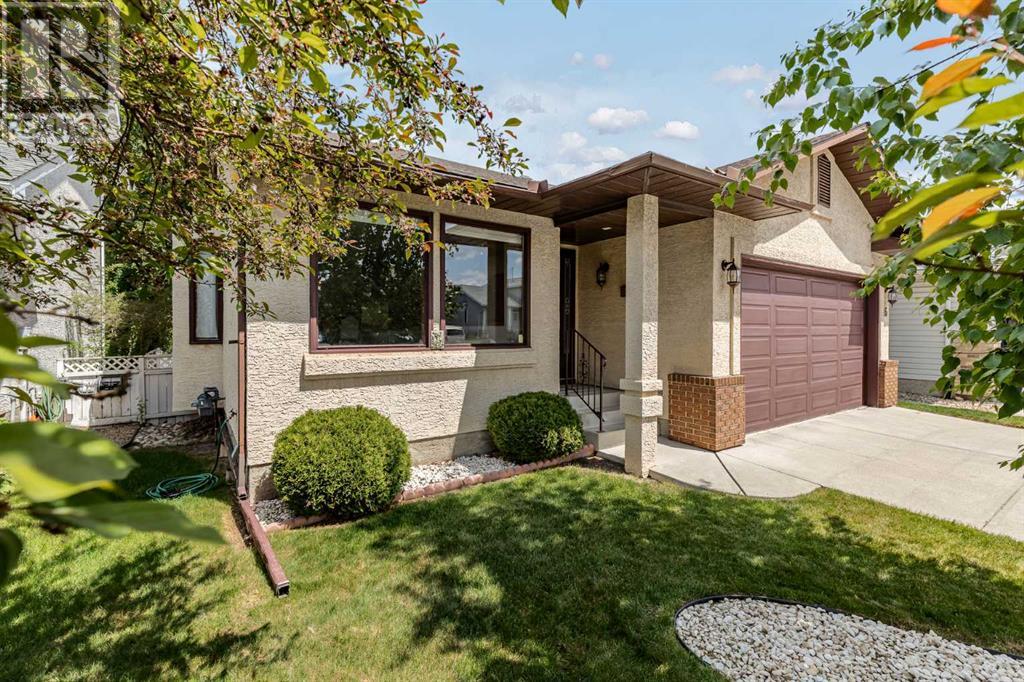 16 Sandalwood Close Nw, Calgary, Alberta  T3K 3Z4 - Photo 2 - A2228361