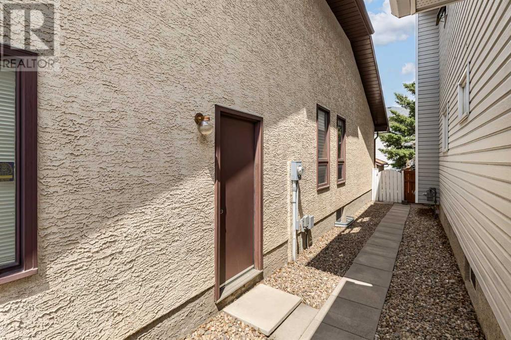 16 Sandalwood Close Nw, Calgary, Alberta  T3K 3Z4 - Photo 48 - A2228361