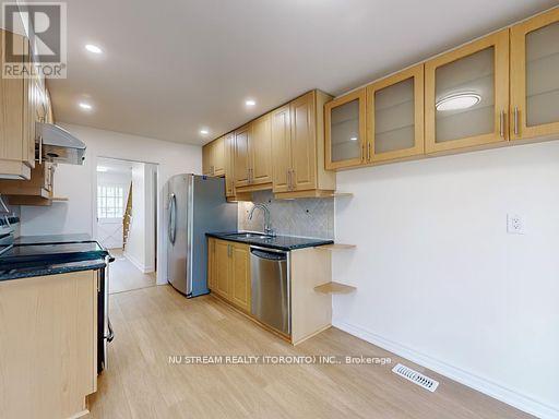 15 Glen Springs Drive, Toronto, Ontario  M1W 1X7 - Photo 7 - E12206960