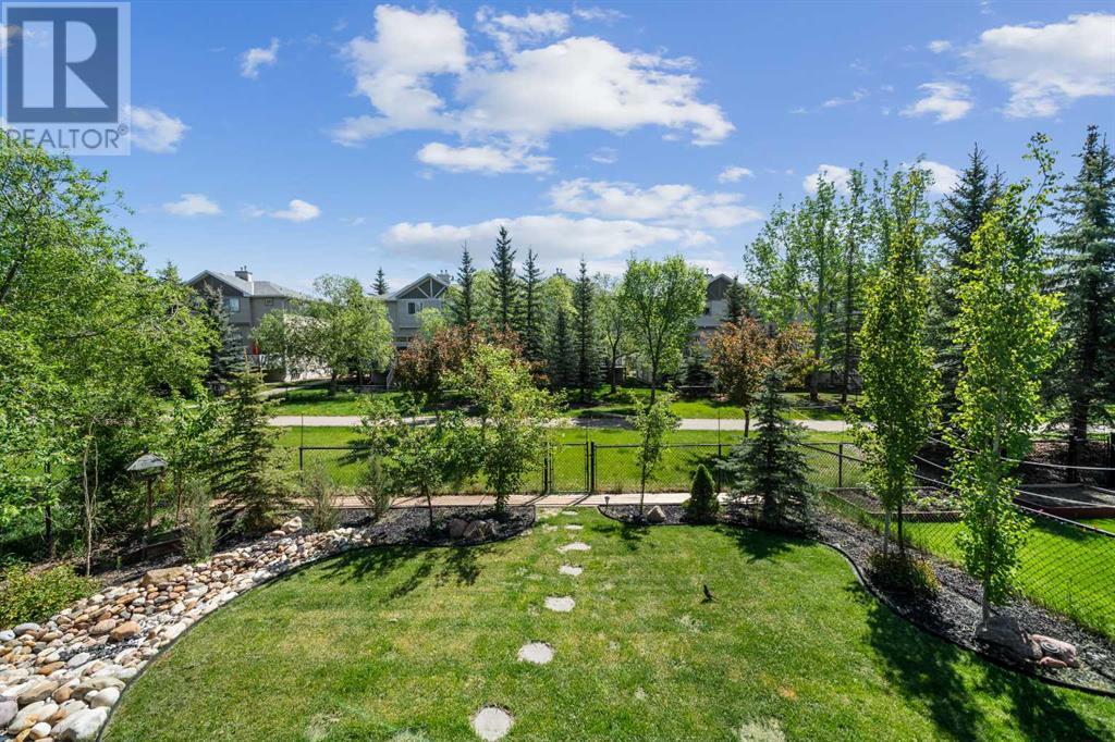 277 Crystal Shores Drive, Okotoks, Alberta  T1S 2C7 - Photo 38 - A2225428
