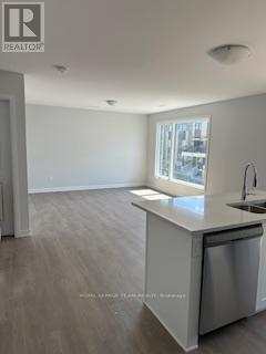 1421 Creekway Private, Ottawa, Ontario  K2P 0T6 - Photo 4 - X12207370