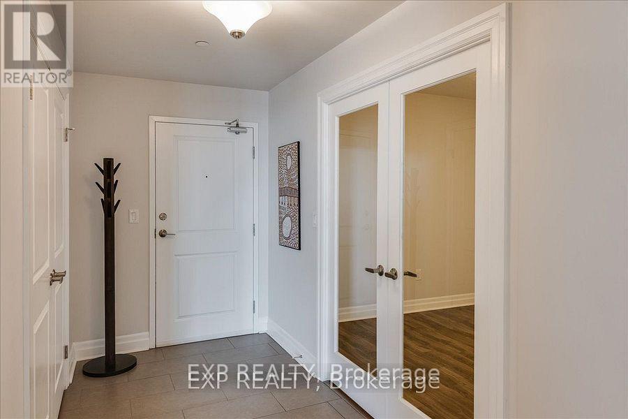 409 - 260 Villagewalk Boulevard, London North (North R), Ontario  N5X 0A6 - Photo 6 - X12207390