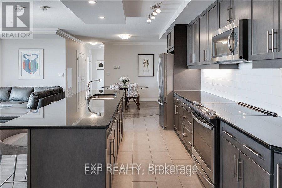 409 - 260 Villagewalk Boulevard, London North (North R), Ontario  N5X 0A6 - Photo 9 - X12207390