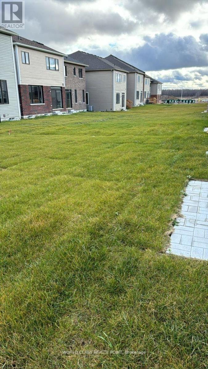 24 Rochester Drive, Barrie (Innis-Shore), Ontario  L9J 0W1 - Photo 2 - S12199476