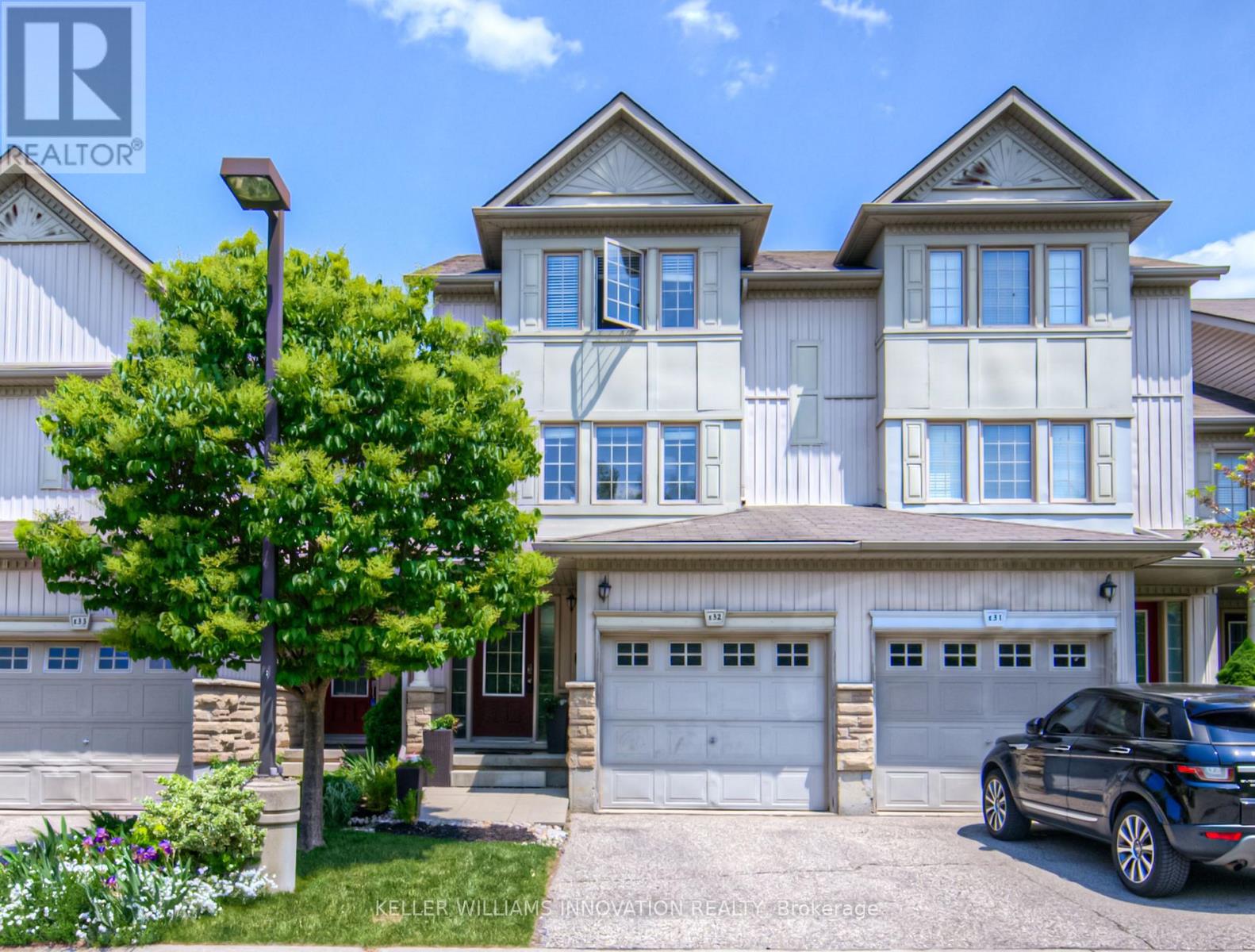 E32 - 85 Bankside Drive, Kitchener, Ontario  N2N 3M4 - Photo 1 - X12207628