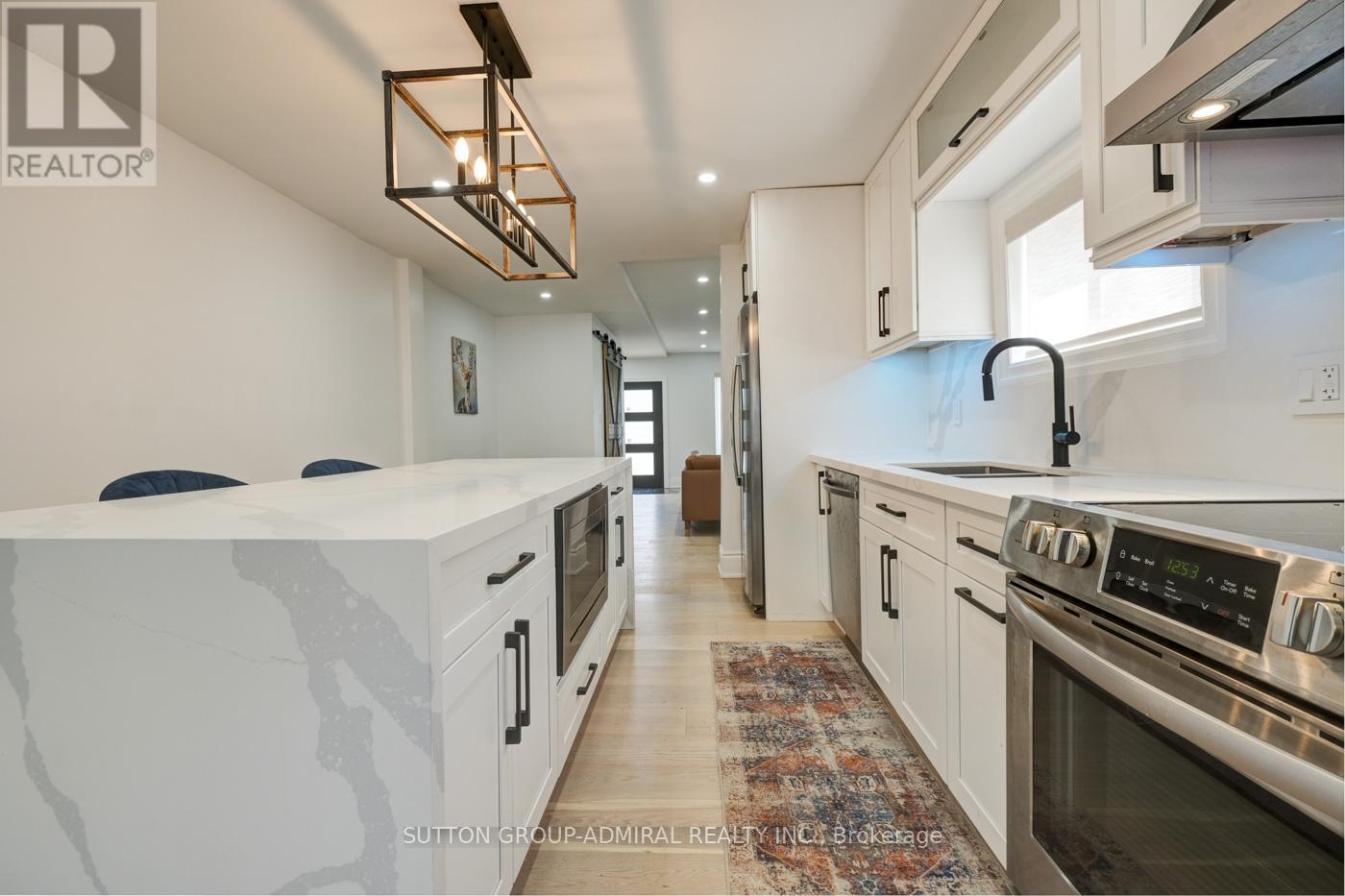 Main & 2nd Floor - 70 Carlaw Avenue, Toronto, Ontario  M4M 2R7 - Photo 11 - E12205950