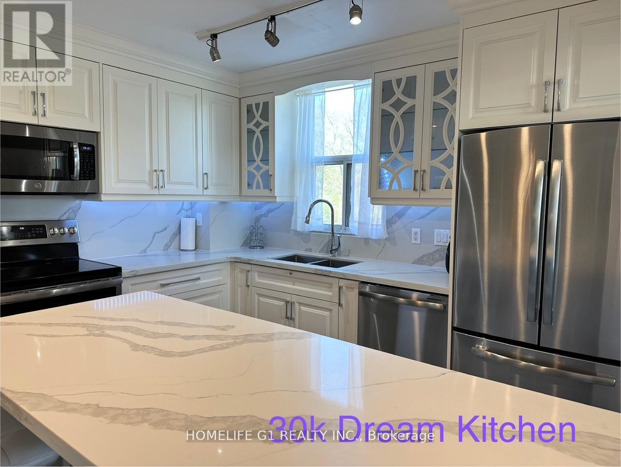 203 - 60 Pavane Linkway, Toronto, Ontario  M3C 1A1 - Photo 3 - C12208046