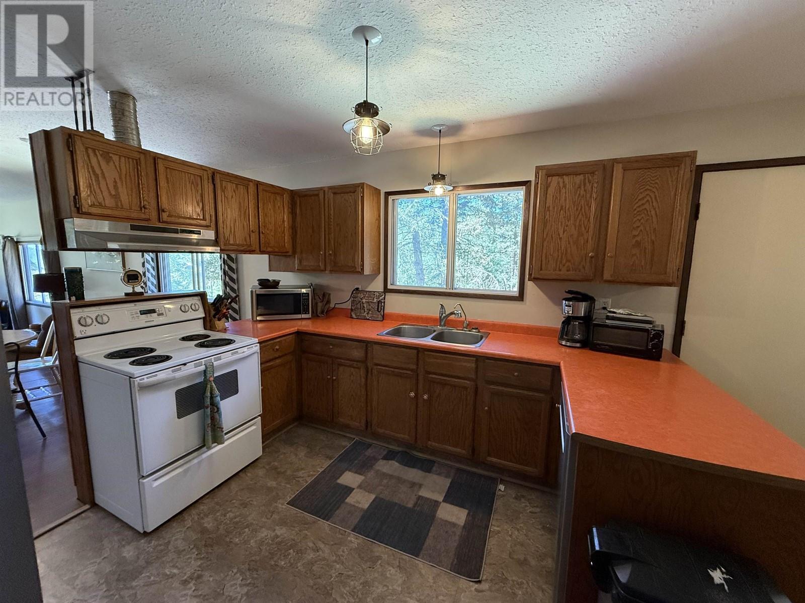 4719 Cariboo Drive, 108 Mile Ranch, British Columbia  V0K 2Z0 - Photo 27 - R3013296