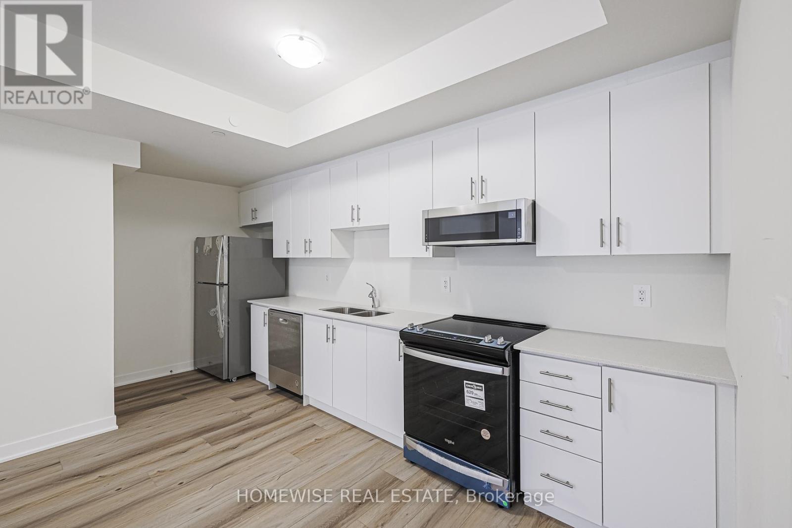 203 - 755 Omega Drive, Pickering, Ontario  L1V 0H1 - Photo 1 - E12208181