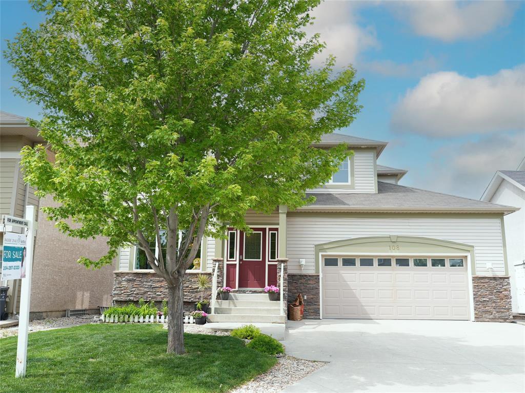 108 Lake Forest Road Winnipeg, Manitoba 1R//Winnipeg/Offer as receives. This stunning Bridgwater Forest 4-bedroom home with Lovely curb appeal, a flex room and 3.5 bathrooms, offering breath-taking lake views, and boasting 18-foot ceilings and grand windows that fill the space with light. The kitchen features luxurious white quartz countertops, elegant maple cabinetry, and newer stainless steel appliances. Relax in the great room by the spectacular stone fireplace. The luxurious sized master suite offers soothing lake views, a spa-like bathroom, and a spacious walk-in closet. Two inviting bedrooms upstairs each have a 4-piece bath, while the flex room presents endless possibilities media room, study, or extra bedroom. Updates include BRAND NEW Air Conditioner (2025 with 10 year warranty); The garage door opener (2024); Refrigerator, Stove, Dishwasher, Hot Water Tank, Range Hood, Water Softener and Radon Mitigation System(2023). The fully finished basement includes a cozy family room, wet bar, fireplace, and fourth bedroom. Outside, enjoy the Barkman stone patio, fenced yard, and deck with glass railings, perfect for sunsets over the lake! (id:48254)