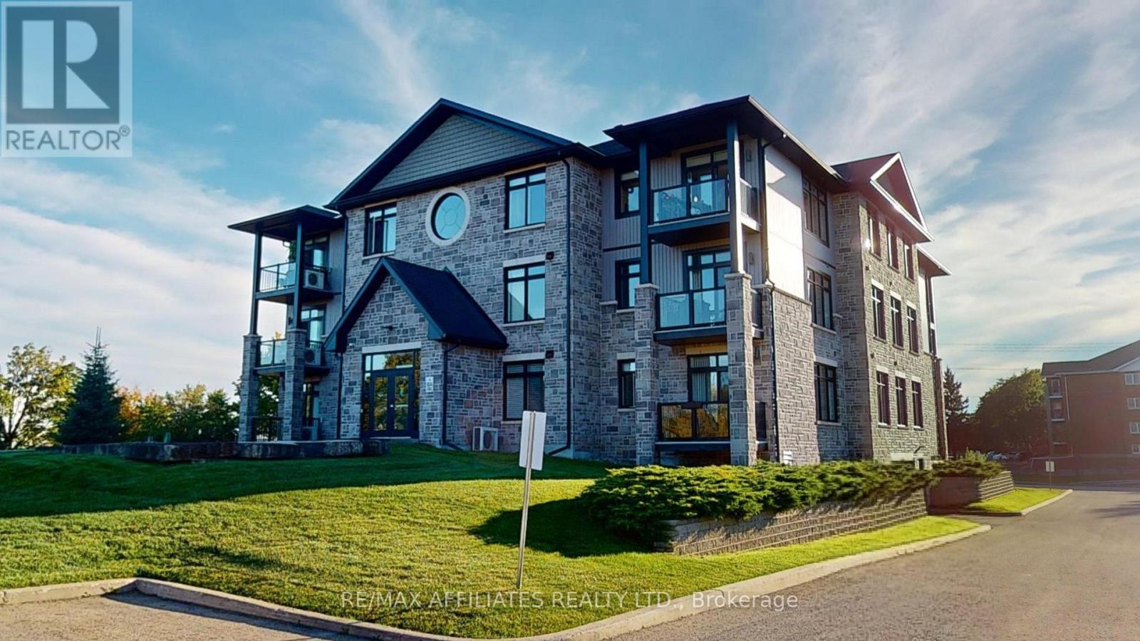 303 - 1109 Millwood Avenue, Brockville, Ontario  K6V 0C7 - Photo 2 - X12208233