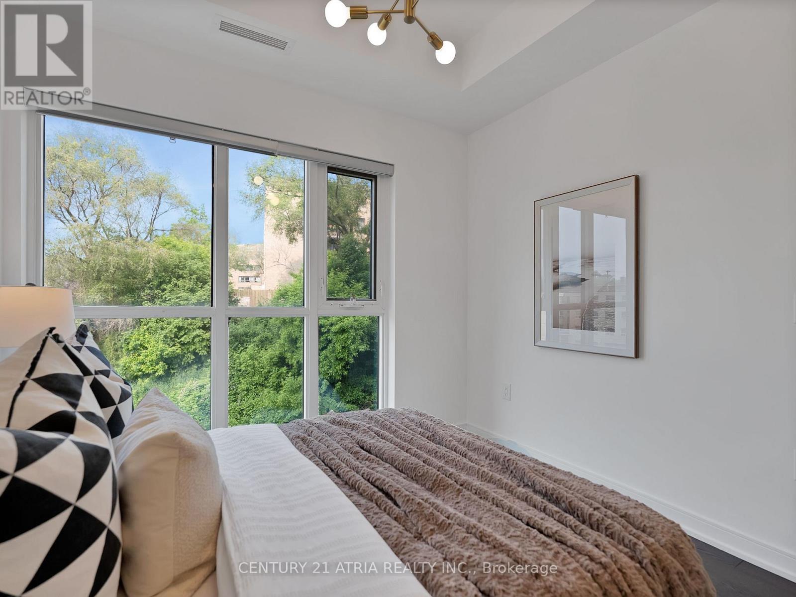 405 - 25 Neighbourhood Lane, Toronto, Ontario  M9Y 0C4 - Photo 17 - W12208412