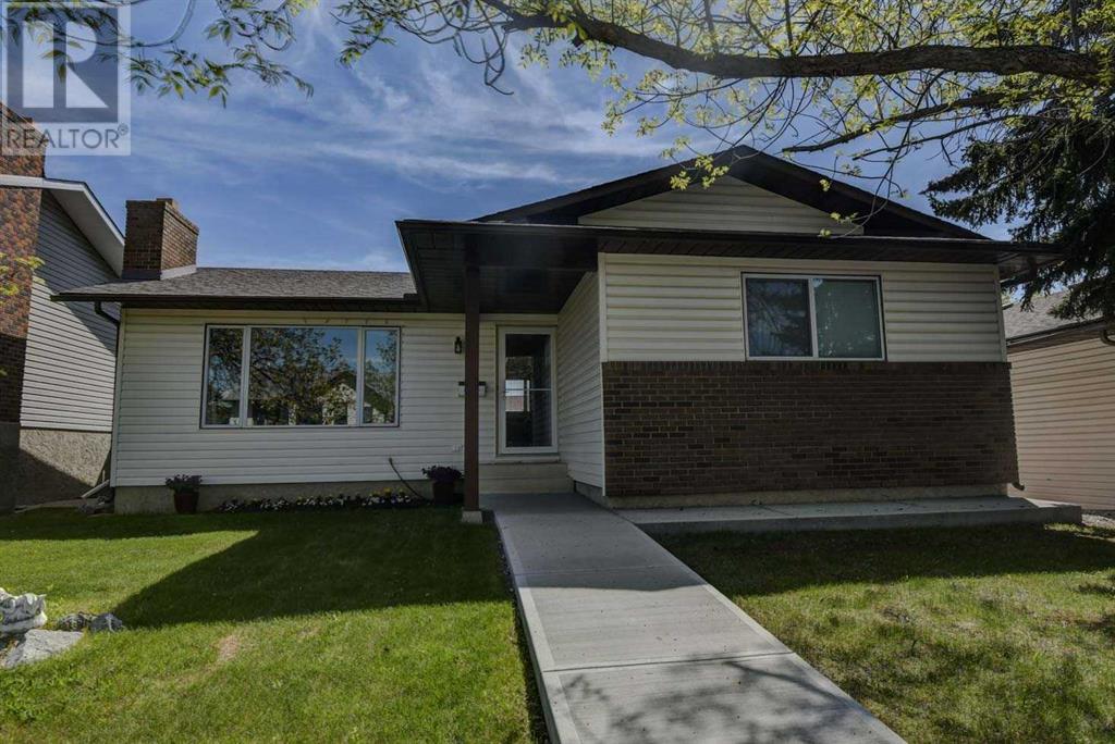 8 Woodbrook Way Sw, Calgary, Alberta  t2w 4e5 - Photo 1 - A2221988