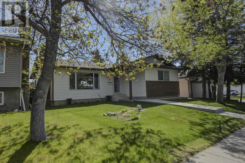 8 Woodbrook Way Sw, Calgary, Alberta  t2w 4e5 - Photo 2 - A2221988