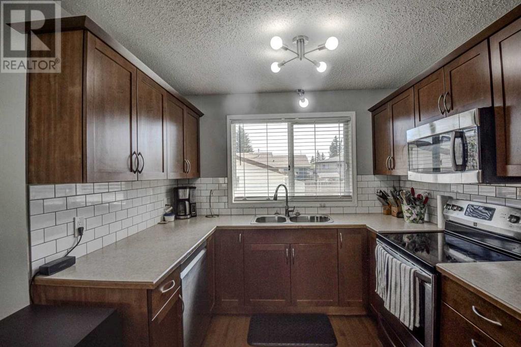8 Woodbrook Way Sw, Calgary, Alberta  t2w 4e5 - Photo 14 - A2221988
