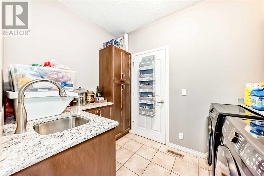 1432 Panatella Boulevard Nw, Calgary, Alberta  T3K 0W2 - Photo 17 - A2219383