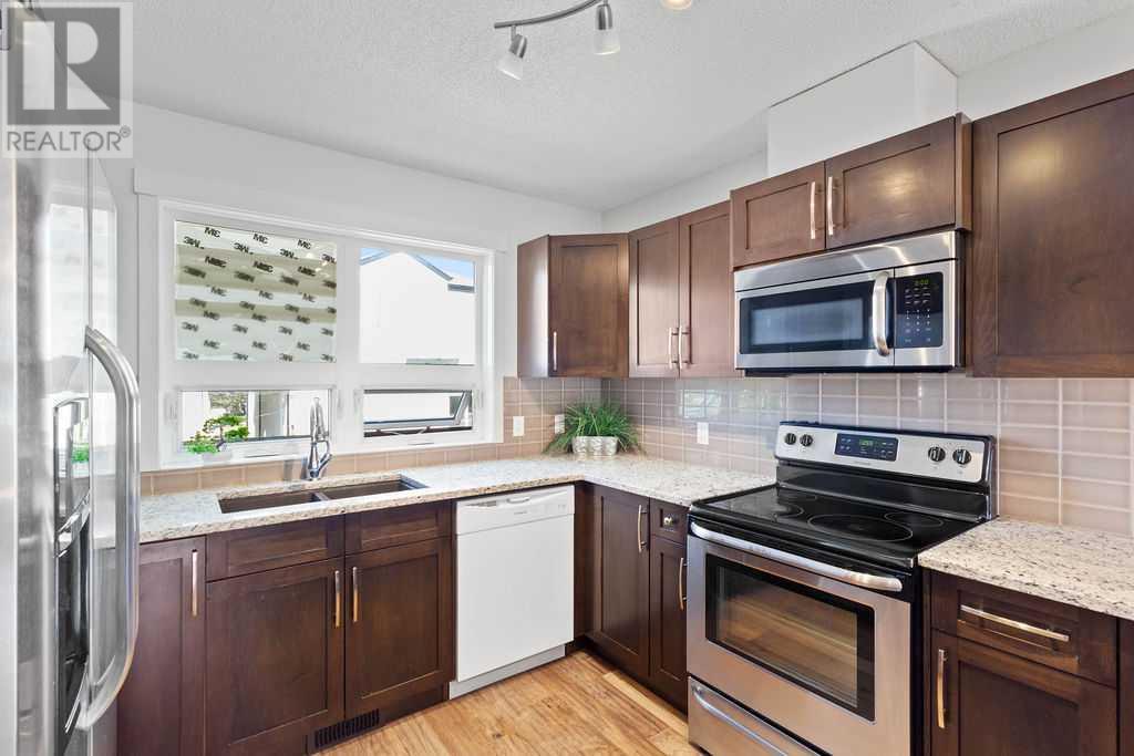 346 Covecreek Circle Ne, Calgary, Alberta  T3K 0W6 - Photo 11 - A2229536