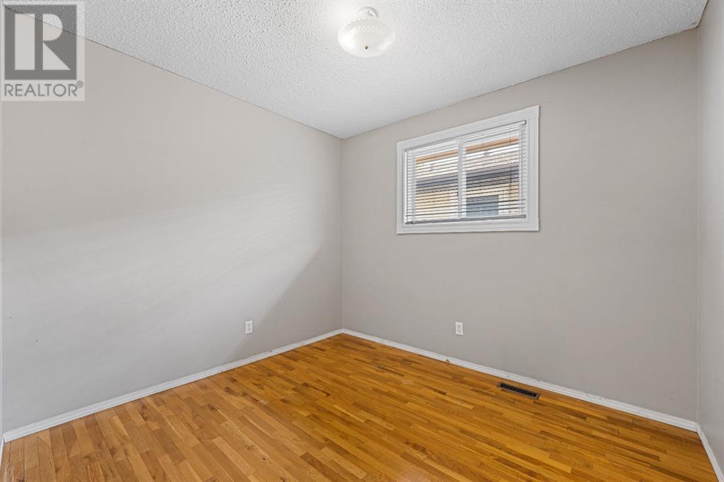 107 Beacham Way Nw, Calgary, Alberta  T3K 1R9 - Photo 13 - A2228761