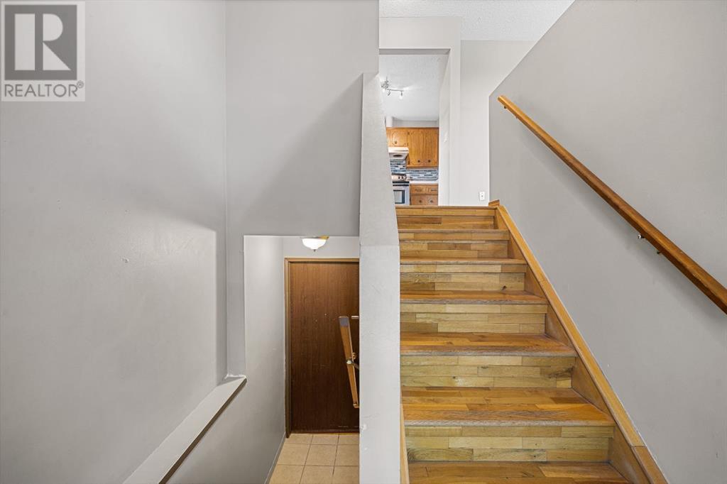 107 Beacham Way Nw, Calgary, Alberta  T3K 1R9 - Photo 21 - A2228761