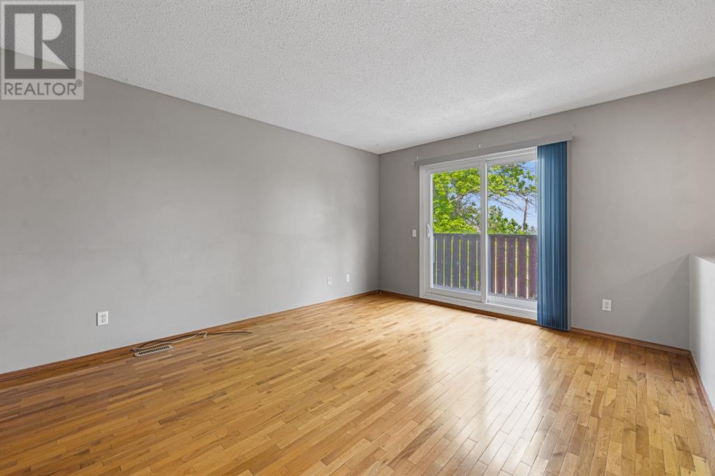 107 Beacham Way Nw, Calgary, Alberta  T3K 1R9 - Photo 6 - A2228761