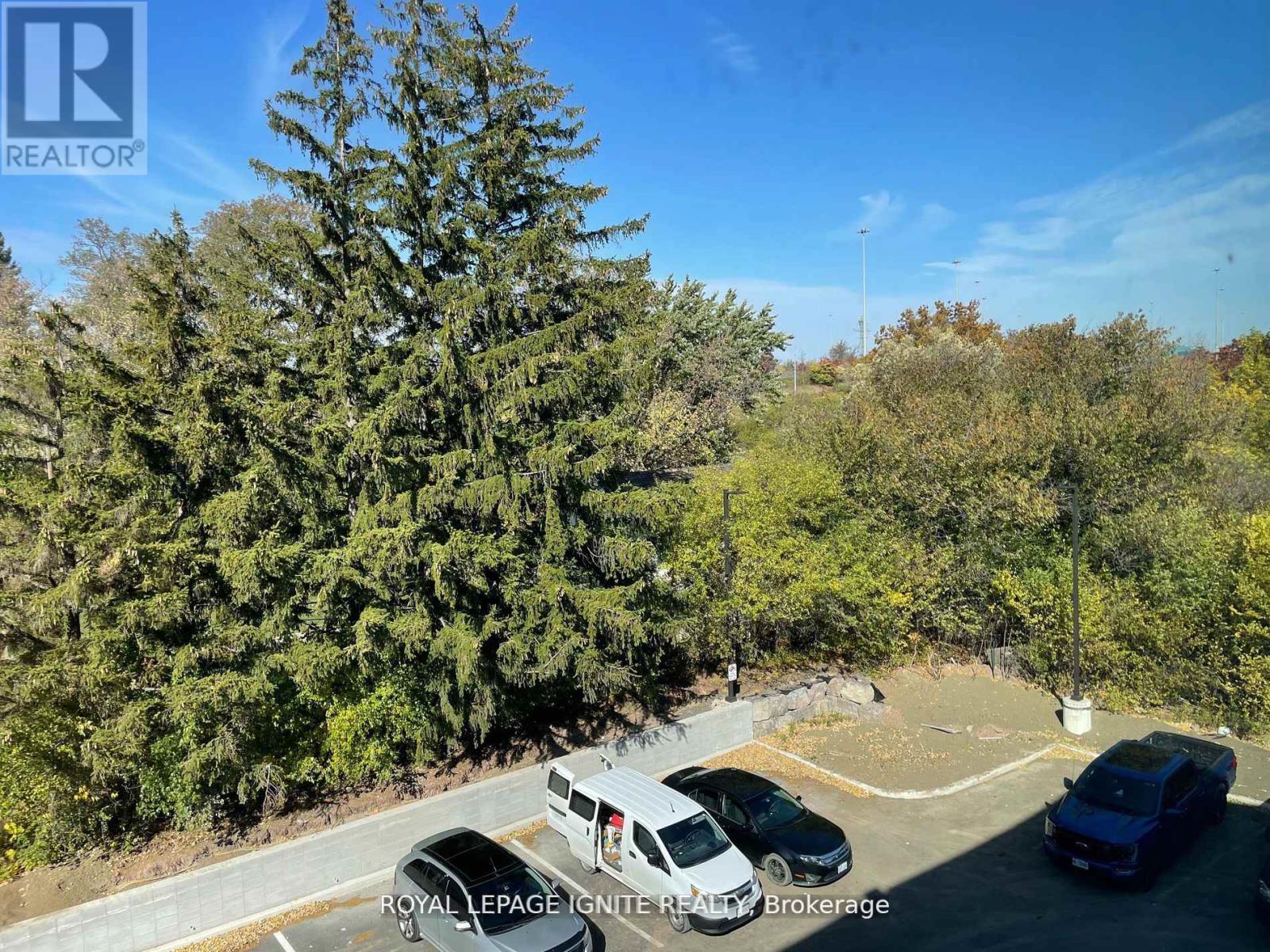 306 - 1670 North Service Road E, Oakville (Qe Queen Elizabeth), Ontario  L6H 7G3 - Photo 8 - W12207941