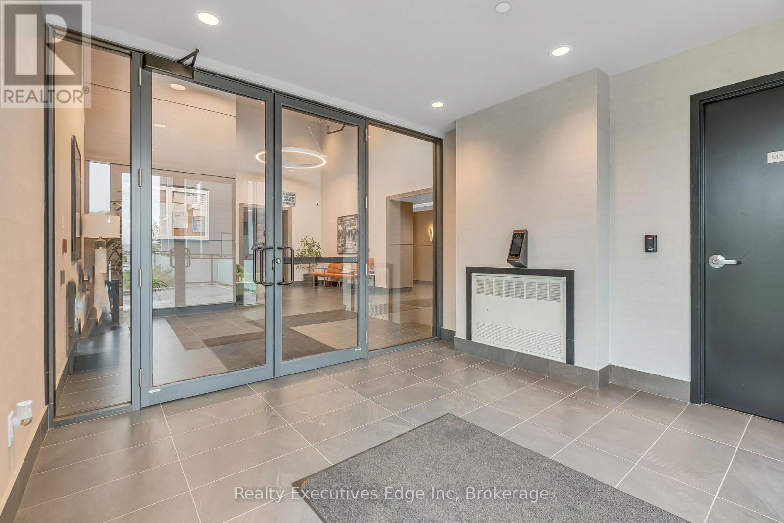 304 - 50 Kaitting Trail, Oakville, Ontario  L6M 5N3 - Photo 3 - W12209223
