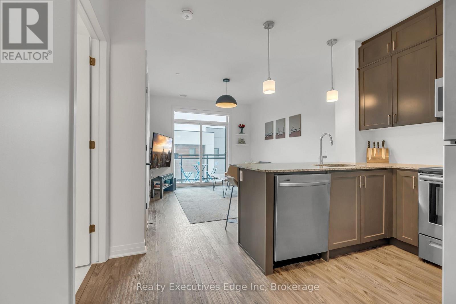 304 - 50 Kaitting Trail, Oakville, Ontario  L6M 5N3 - Photo 6 - W12209223