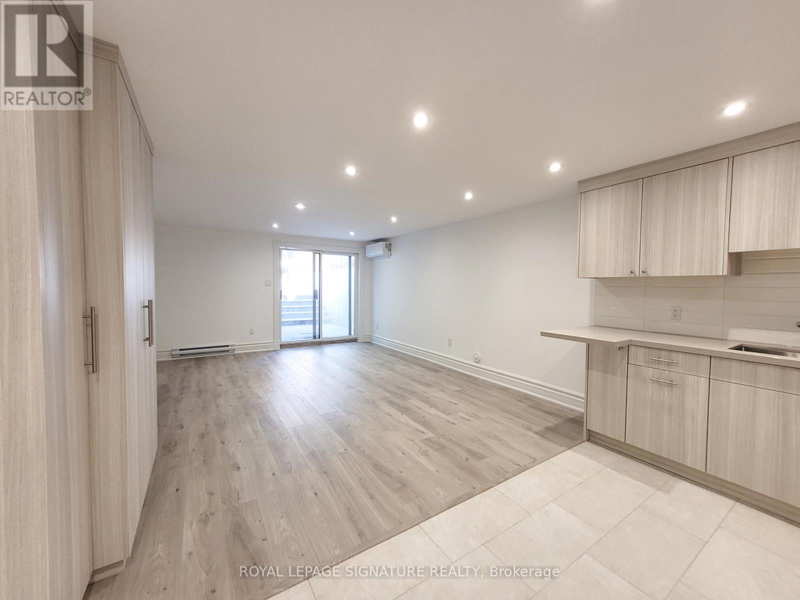 Lower - 18 Coxwell Avenue, Toronto, Ontario  M4L 3A7 - Photo 3 - E12208860