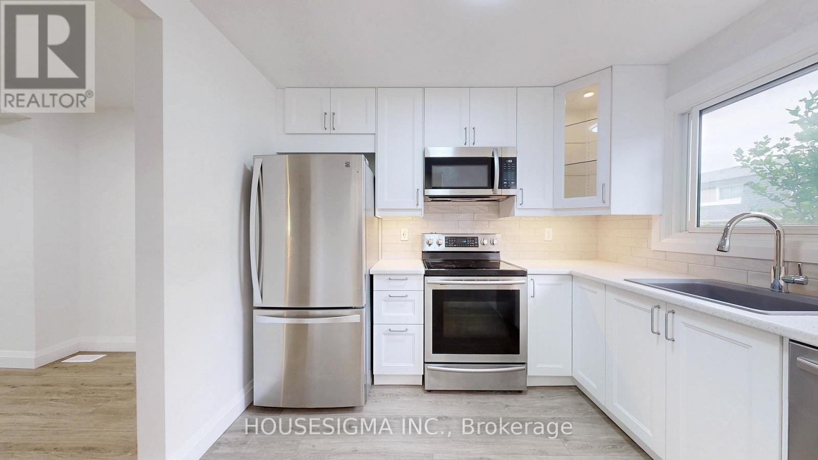 56 - 2050 Upper Middle Road, Burlington (Brant Hills), Ontario  L7P 3R9 - Photo 4 - W12208762