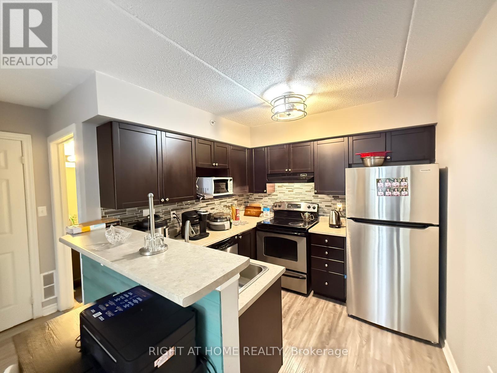 206 - 1340 Main Street E, Milton, Ontario  L9T 7S6 - Photo 3 - W12208801