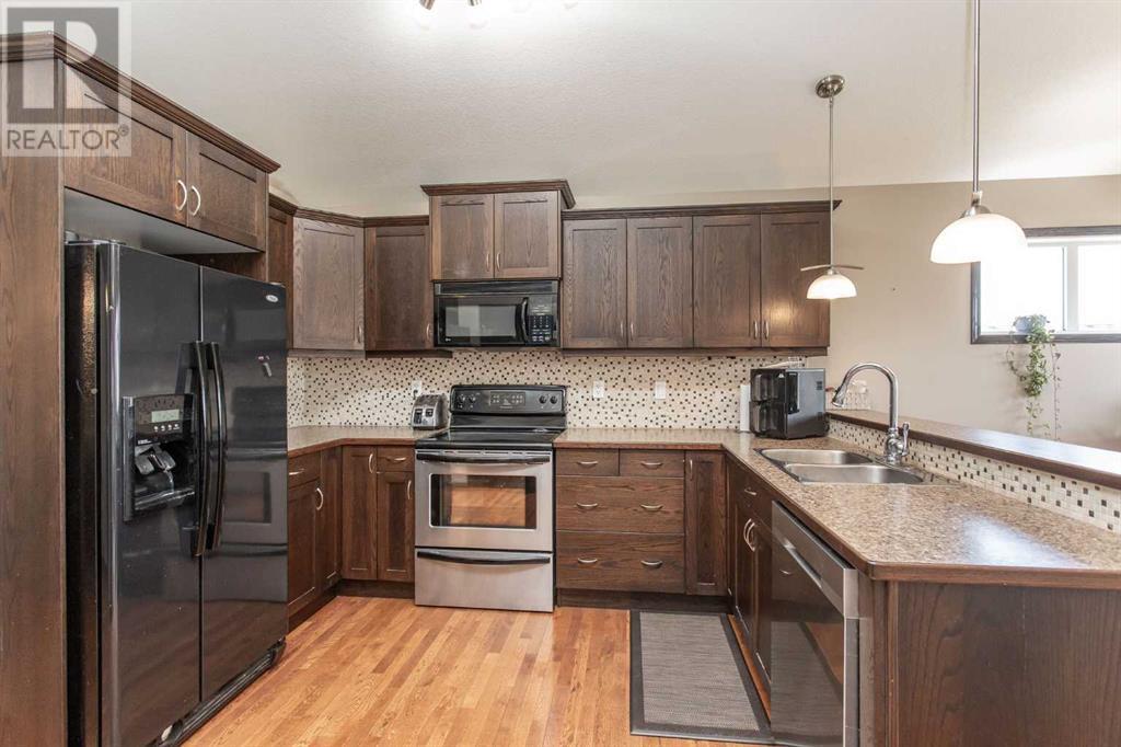 56 Mackenzie Crescent, Lacombe, Alberta  T4S 1X6 - Photo 2 - A2226120