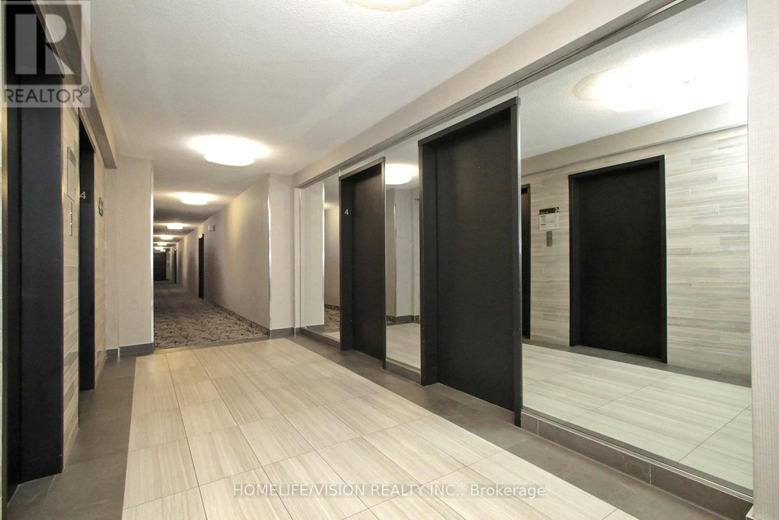 409 - 15 Vicora Linkway, Toronto, Ontario  M3C 1A7 - Photo 4 - C12209444