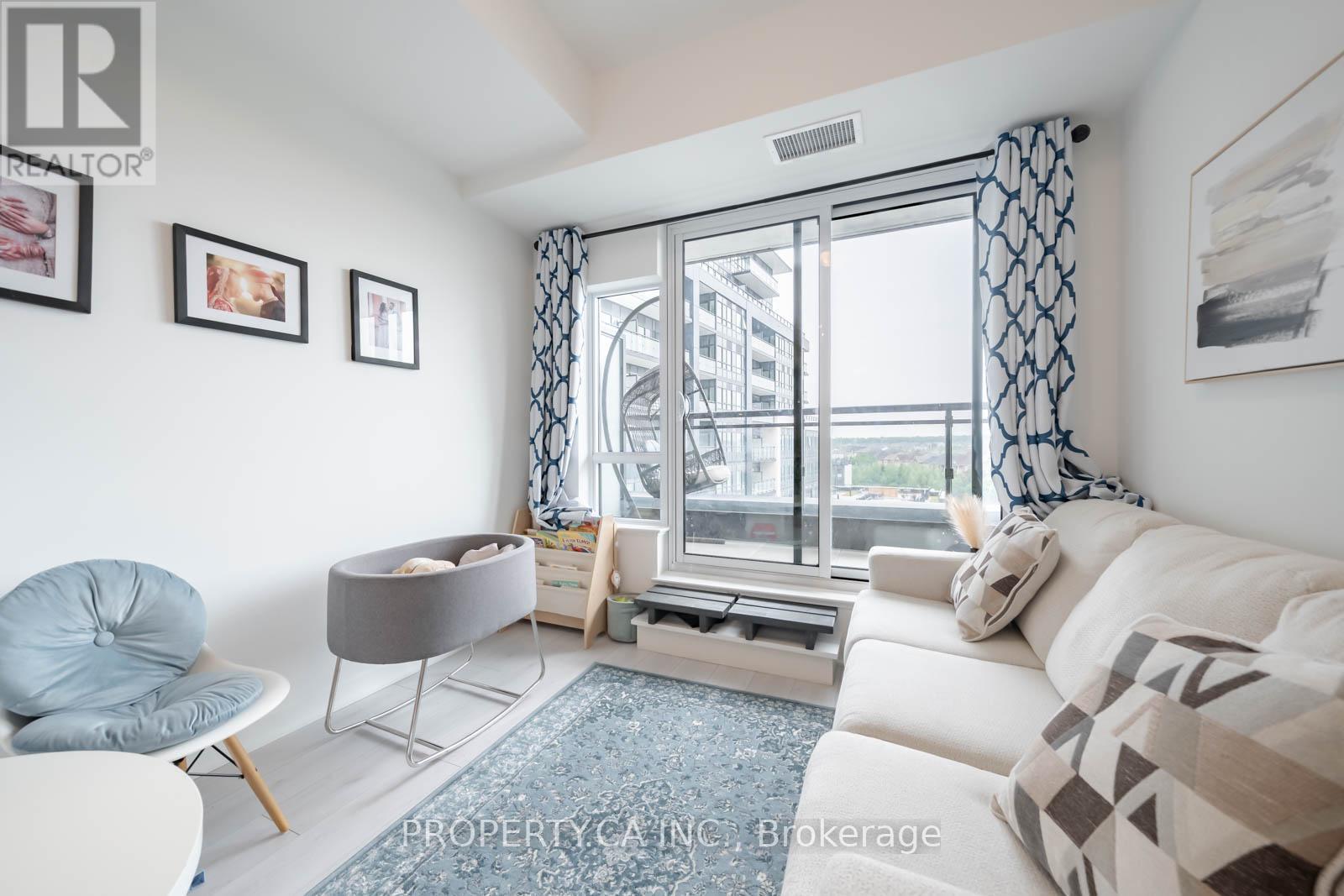 503 - 395 Dundas Street W, Oakville, Ontario  L6M 5R8 - Photo 2 - W12209319