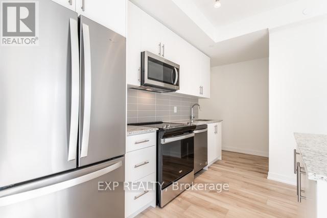 203 - 345 Wheat Boom Drive, Oakville, Ontario  L6H 0R4 - Photo 19 - W12209645