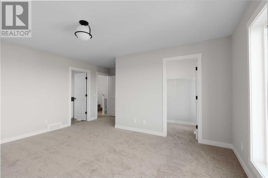 26 Sovereign Heights Sw, Calgary, Alberta  T3C 3Y3 - Photo 25 - A2227729