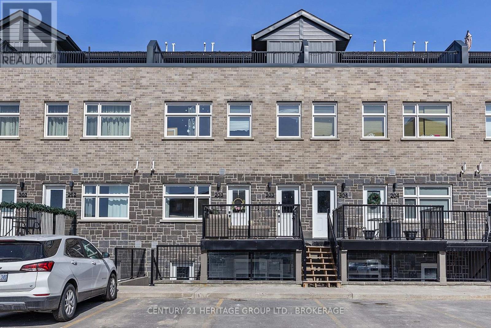 203 - 809 Development Drive, Kingston (South Of Taylor-Kidd Blvd), Ontario  K7M 0J4 - Photo 1 - X12210411
