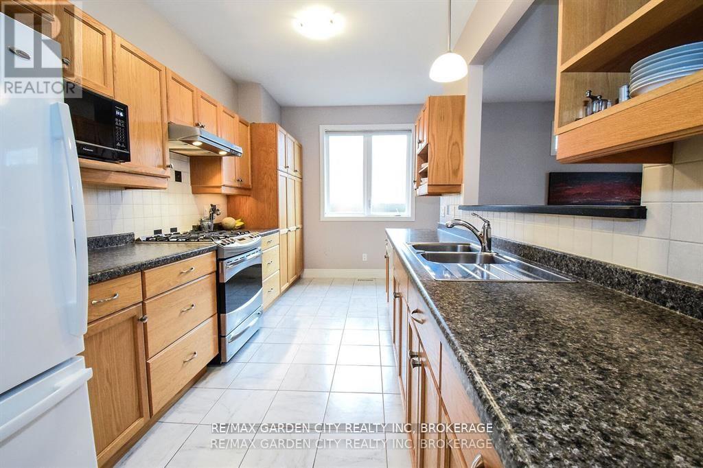 1 - 165 Glendale Avenue, St. Catharines, Ontario  L2T 2K2 - Photo 6 - X12210551