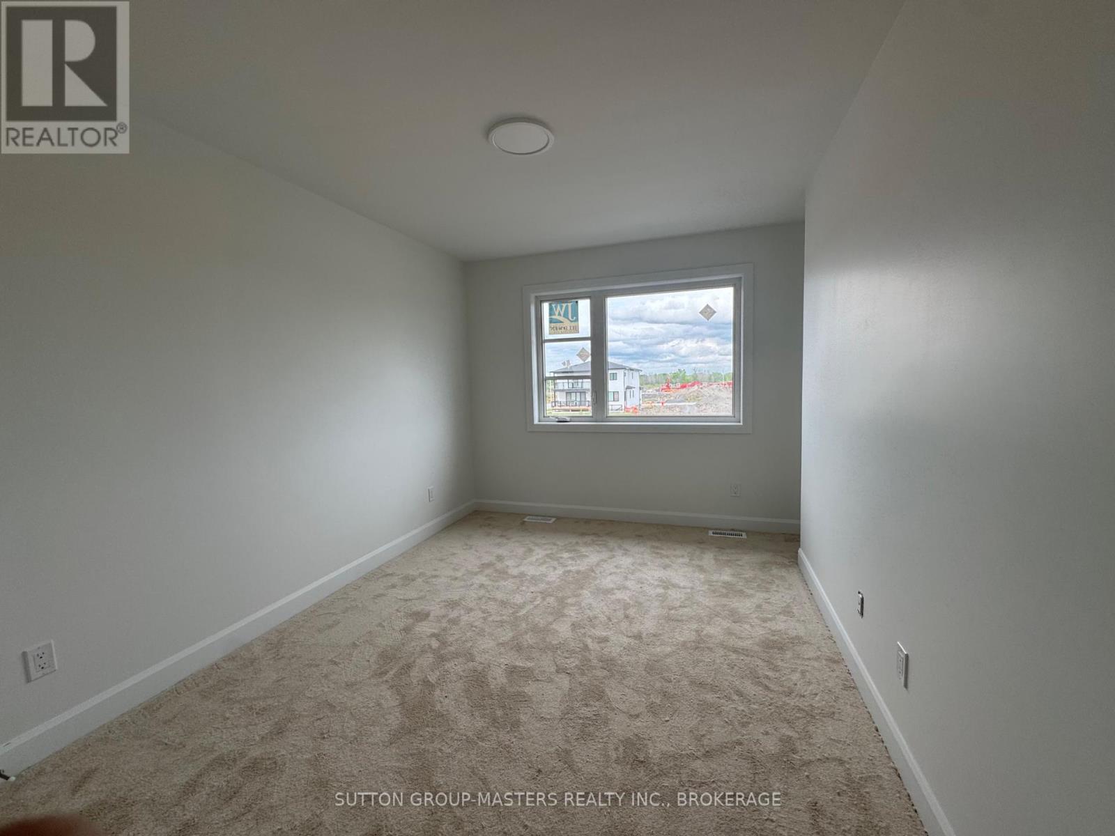 210 Dr Richard James Crescent, Loyalist, Ontario  K7N 0E9 - Photo 19 - X12183839