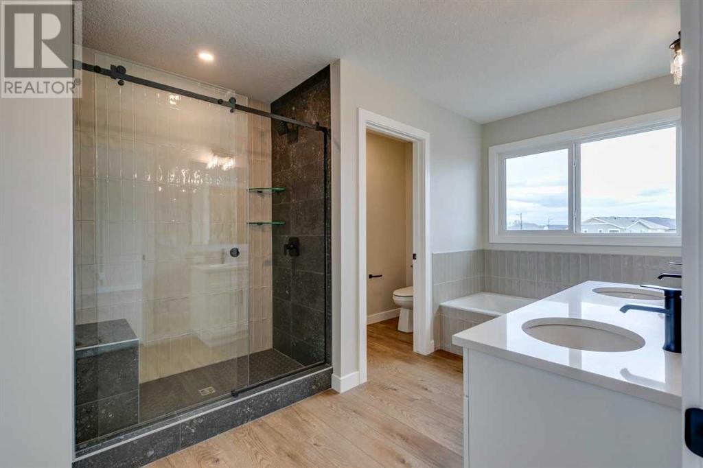18 Snowberry Lane, Okotoks, Alberta  T1S 5X8 - Photo 43 - A2202413