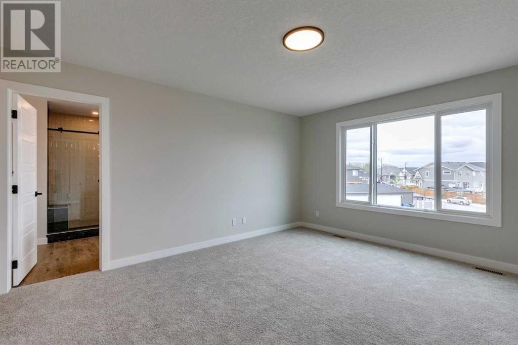 18 Snowberry Lane, Okotoks, Alberta  T1S 5X8 - Photo 40 - A2202413