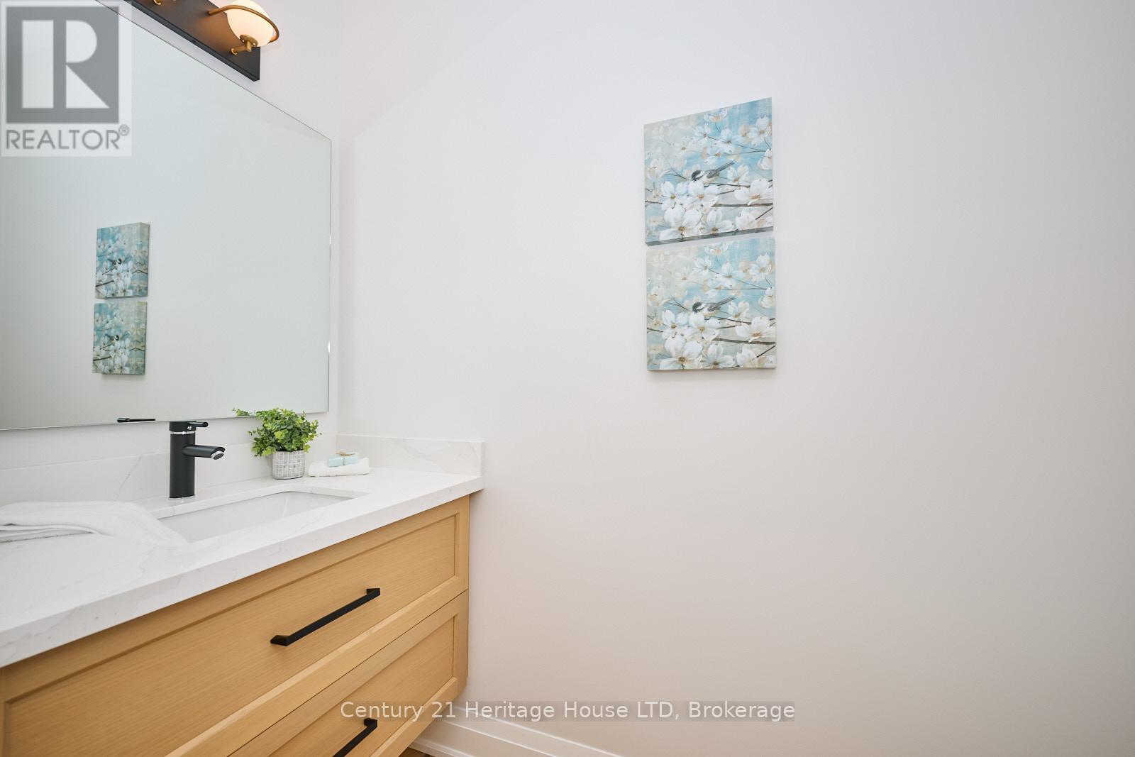 61.5b Jarrow Road, St. Catharines (Lakeshore), Ontario  L2M 1B7 - Photo 15 - X12210867