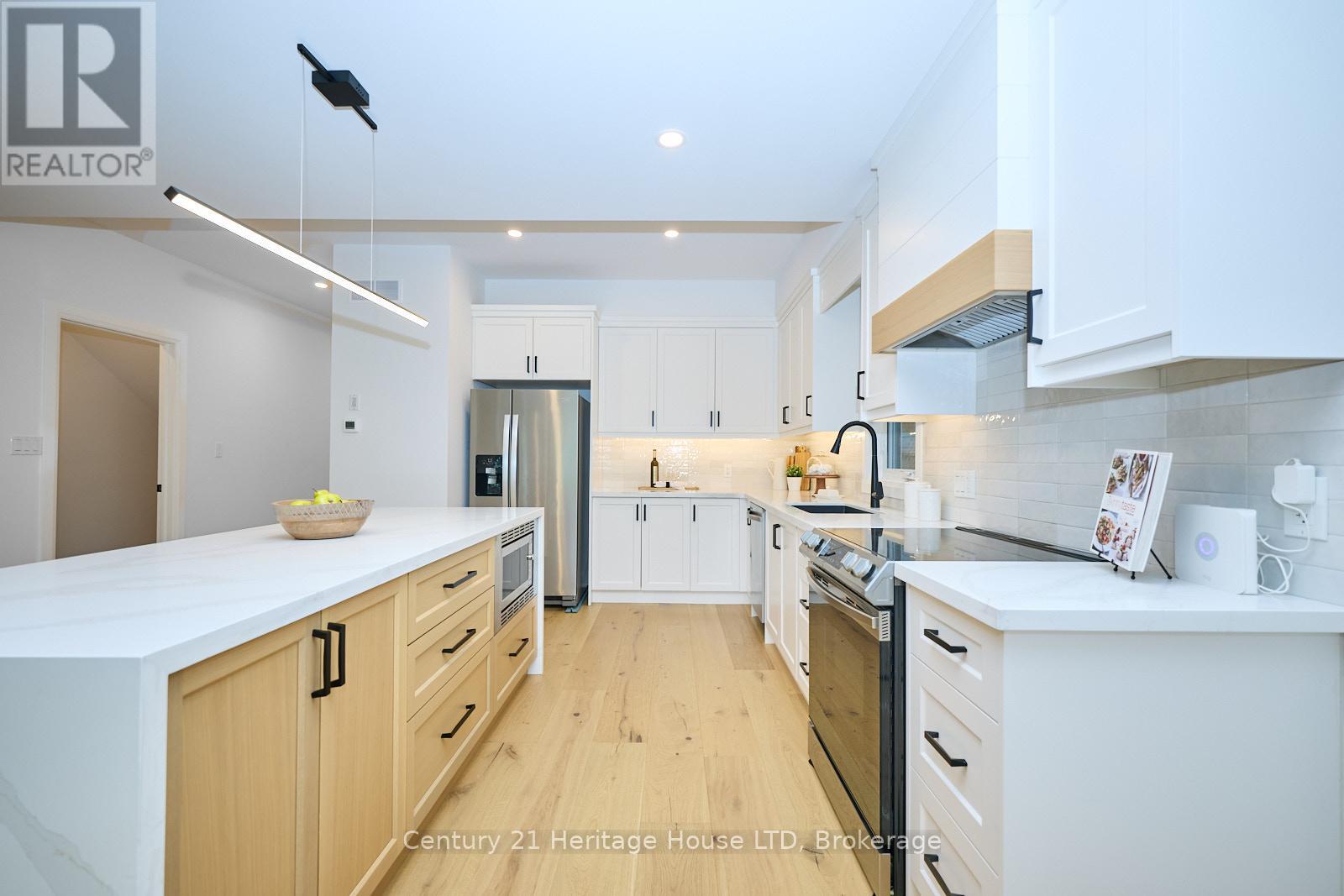 61.5b Jarrow Road, St. Catharines (Lakeshore), Ontario  L2M 1B7 - Photo 6 - X12210867