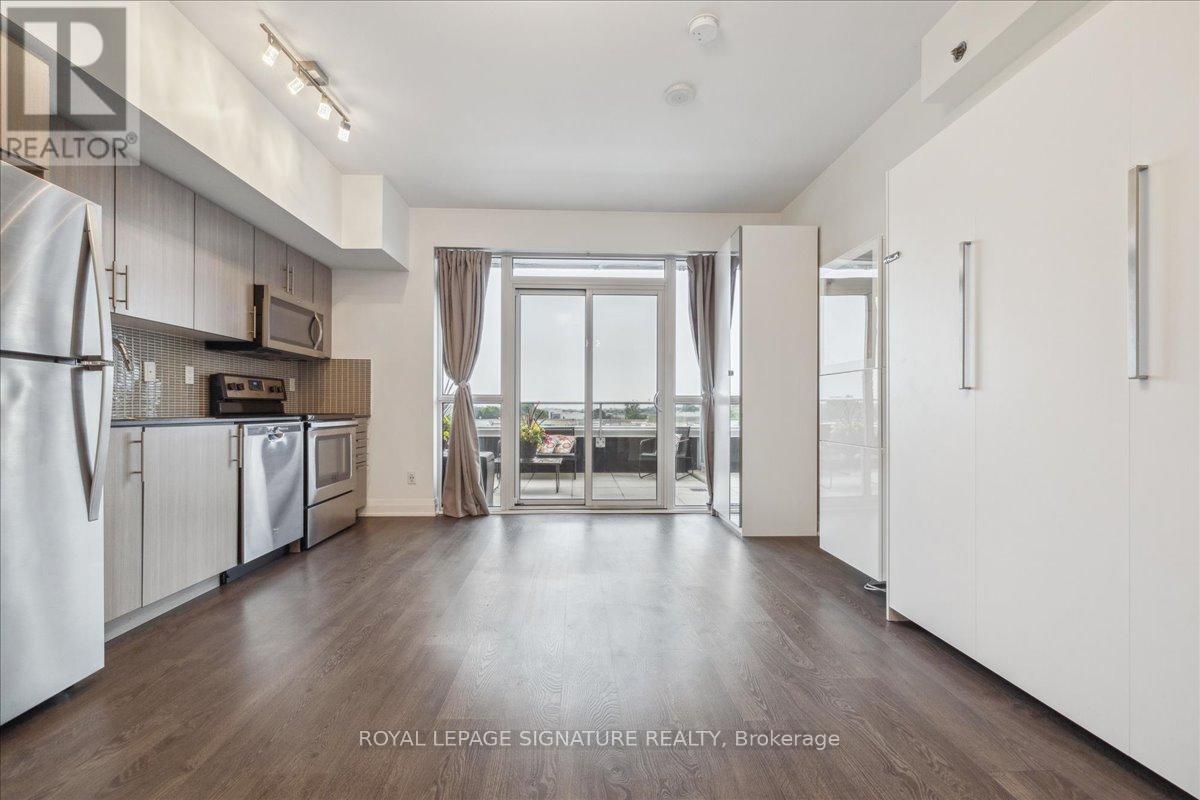 412 - 55 Speers Road, Oakville (Qe Queen Elizabeth), Ontario  L6K 0H9 - Photo 4 - W12210694